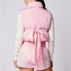 Pink Puffer Vest with Bow Detail